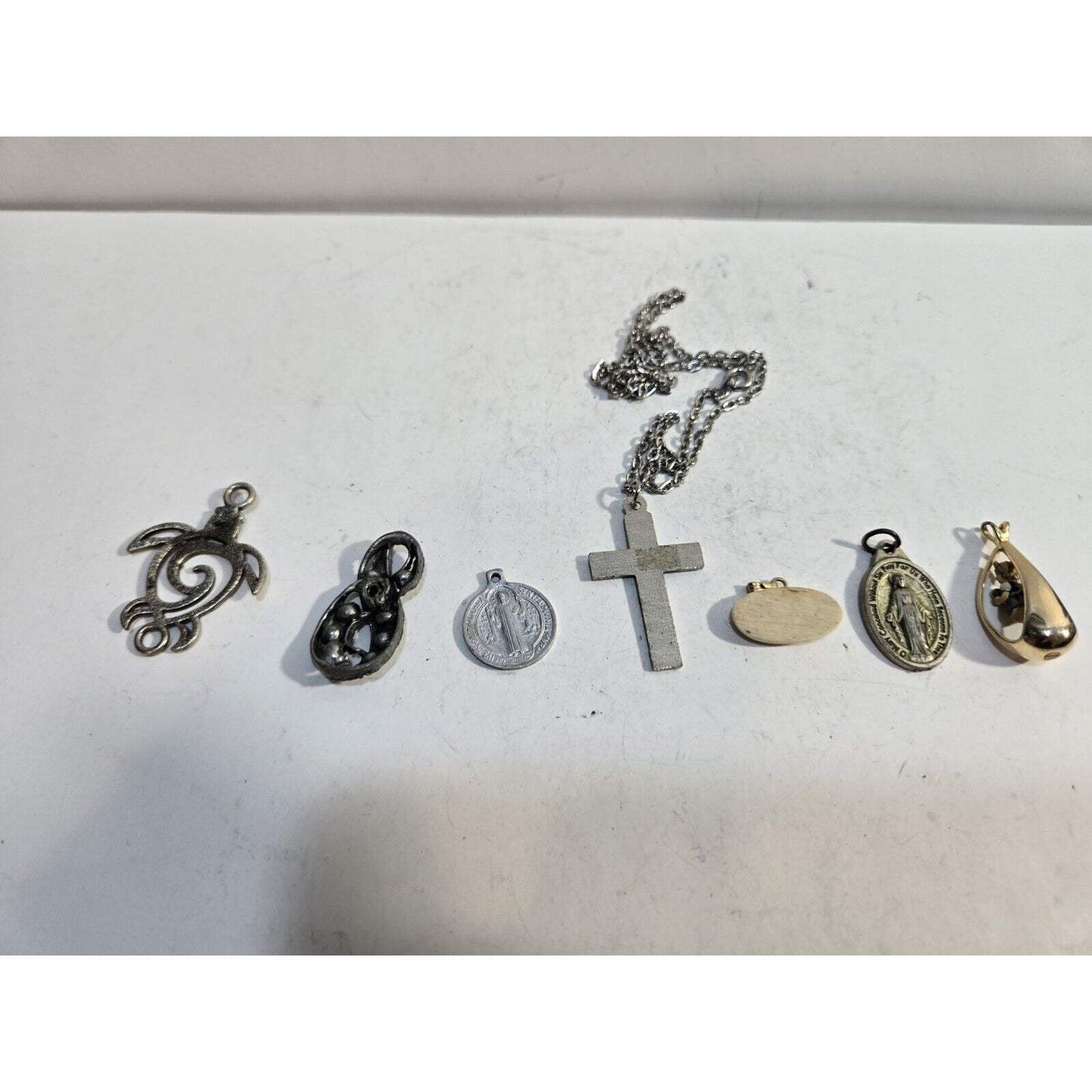 lot of 7 vintage collectible pendants