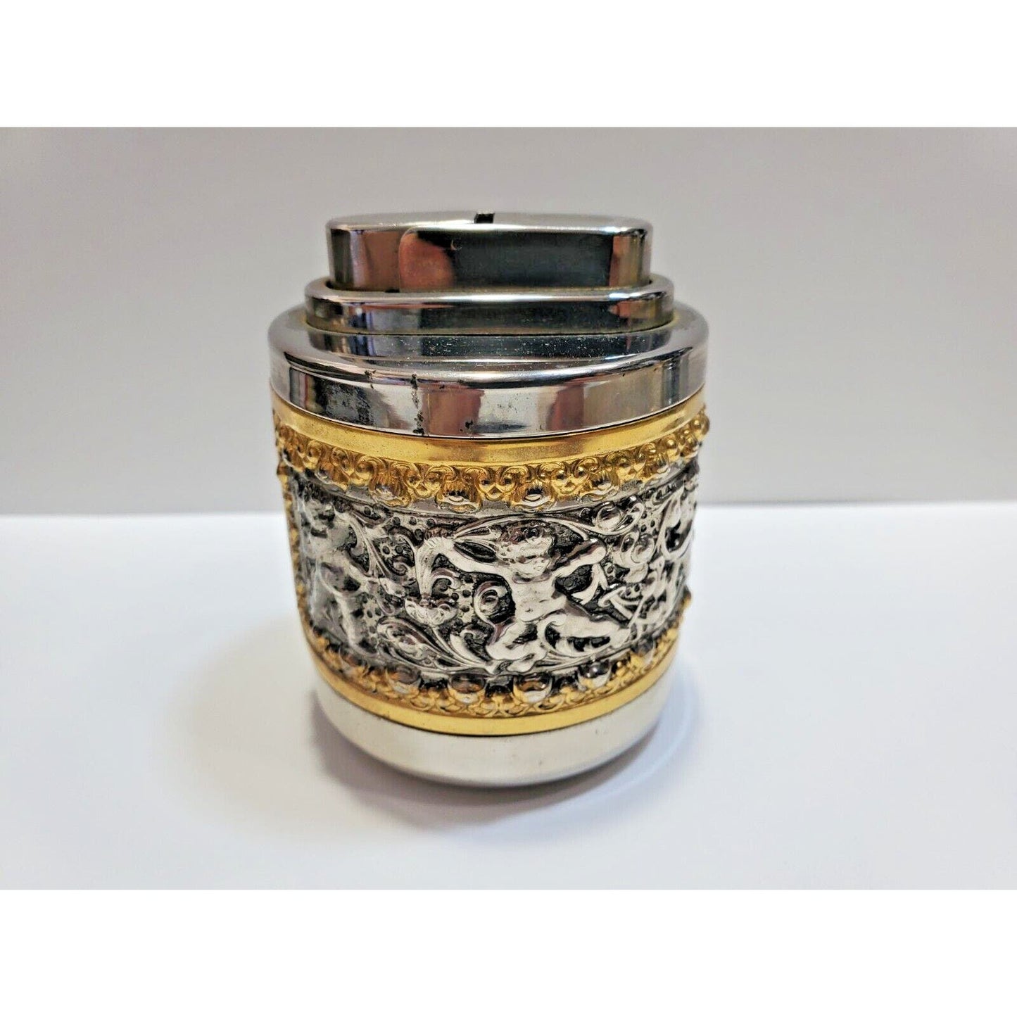 Working 1960s Erhard & Sohne Brass Cigarette Lighter Decorated with Cherubs