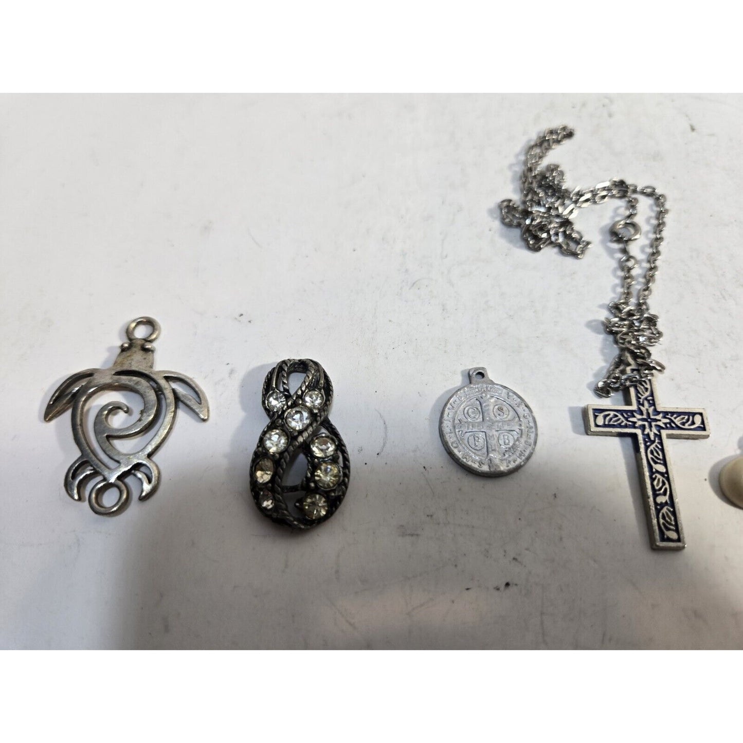 lot of 7 vintage collectible pendants