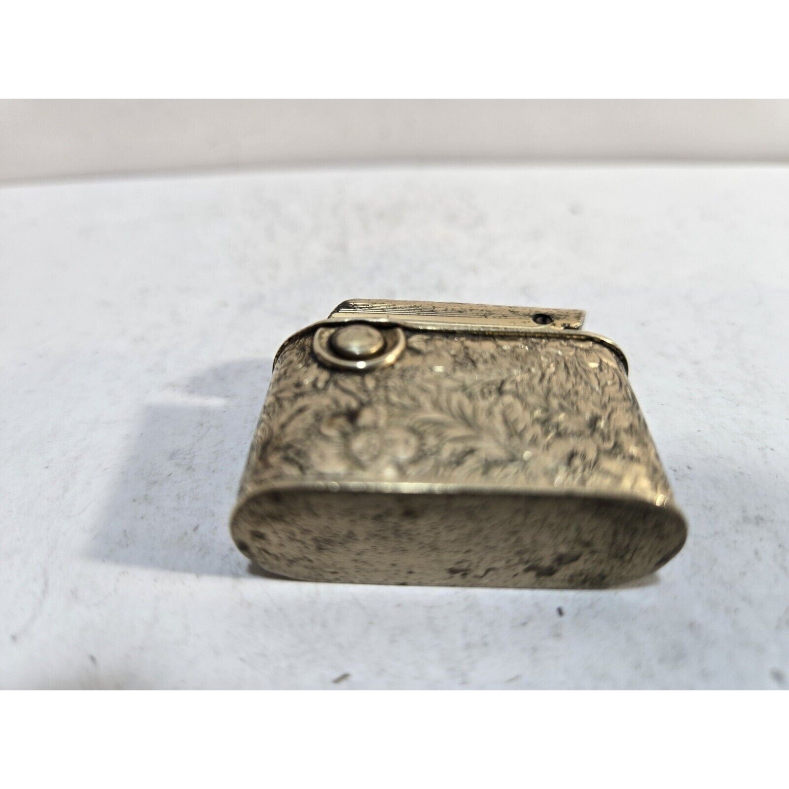 1930s cigarette lighter A Thorens pocket petrol lighter, nickel plated with engine turned decoration, togeth 1930-40"s Desk Top Metal Aviation
