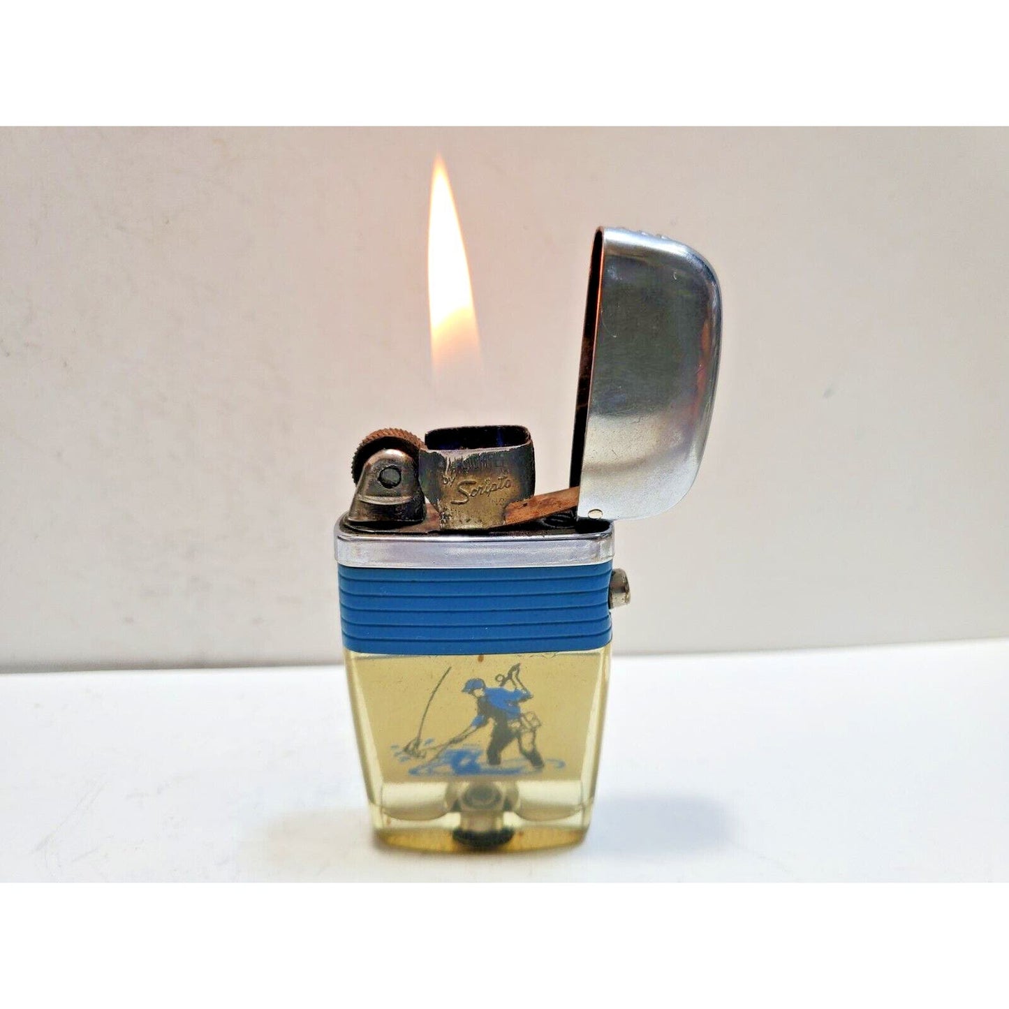 Working Vintage Scripto Fly Fisherman Catching Fish in a Stream-Vu-Lighter Blue