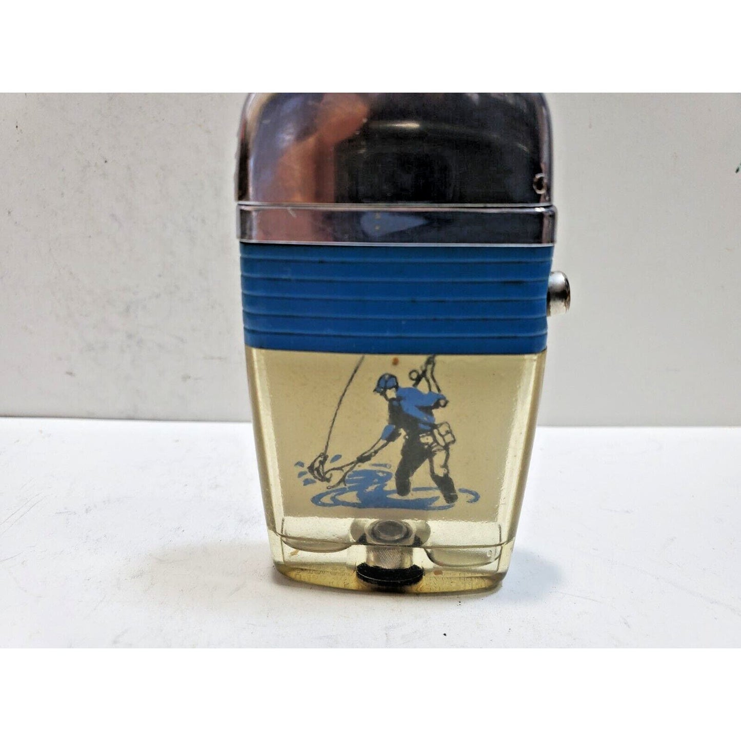 Working Vintage Scripto Fly Fisherman Catching Fish in a Stream-Vu-Lighter Blue