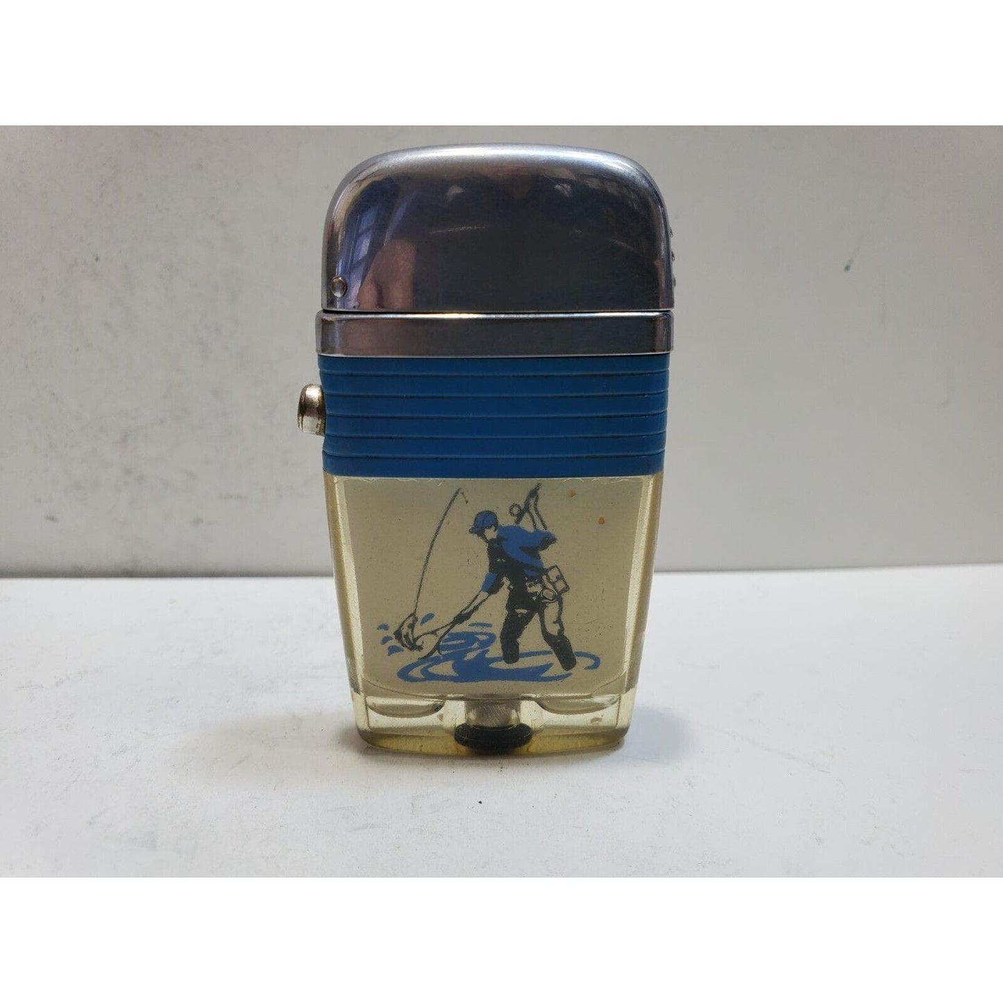 Working Vintage Scripto Fly Fisherman Catching Fish in a Stream-Vu-Lighter Blue