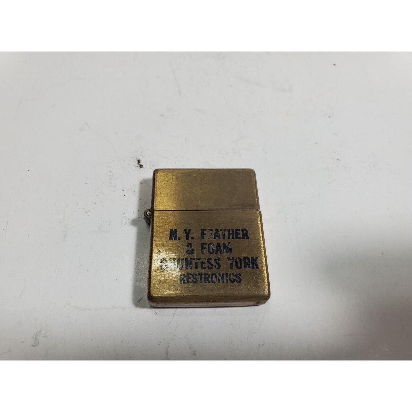 VINTAGE WORKING Mini ADVERTISING LIGHTER "N. Y FEATHER & FOAM" 6081/30