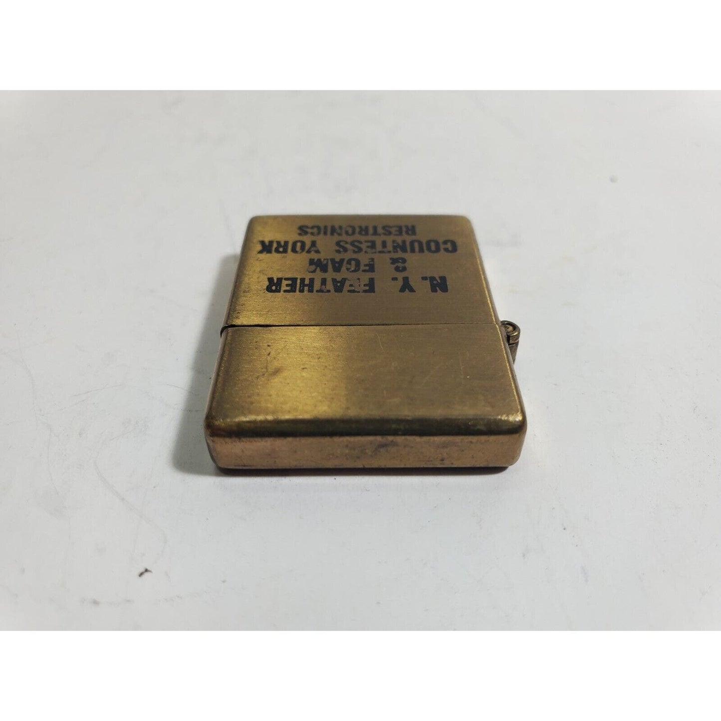 VINTAGE WORKING Mini ADVERTISING LIGHTER "N. Y FEATHER & FOAM" 6081/30