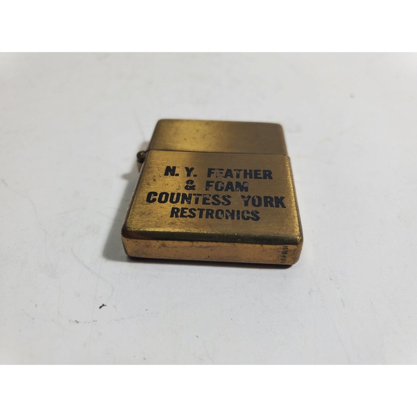VINTAGE WORKING Mini ADVERTISING LIGHTER "N. Y FEATHER & FOAM" 6081/30